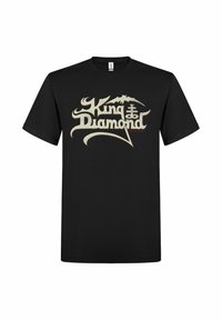 Černé bavlněné tričko s logem "King Diamond" ve velkých, stylizovaných krémových písmenech s červenými akcenty a motivy netopýrů.