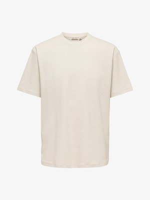 Effen beige, kortärmelig, geribbelde katoenen T-shirt met een ronde hals en een losse pasvorm.