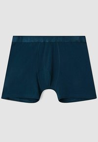 Boxer-briefs pour hommes en bleu foncé, fabriqués en tissu lisse ; avec une ceinture logo texturée et une conception de poche de soutien.