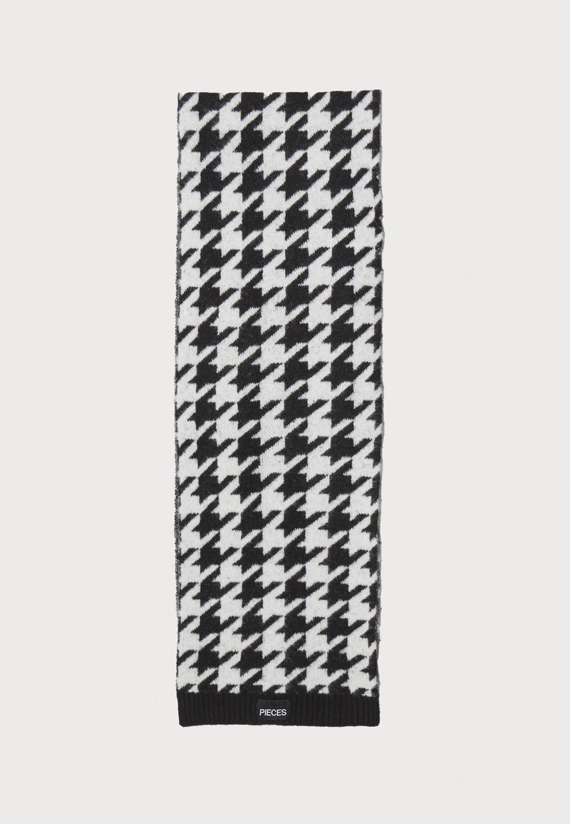 Mustvalge houndstooth-mustriga sall, mis on valmistatud pehmest kangast, sisaldab soonilist musta äärt ja väikest logo sildit allservas.