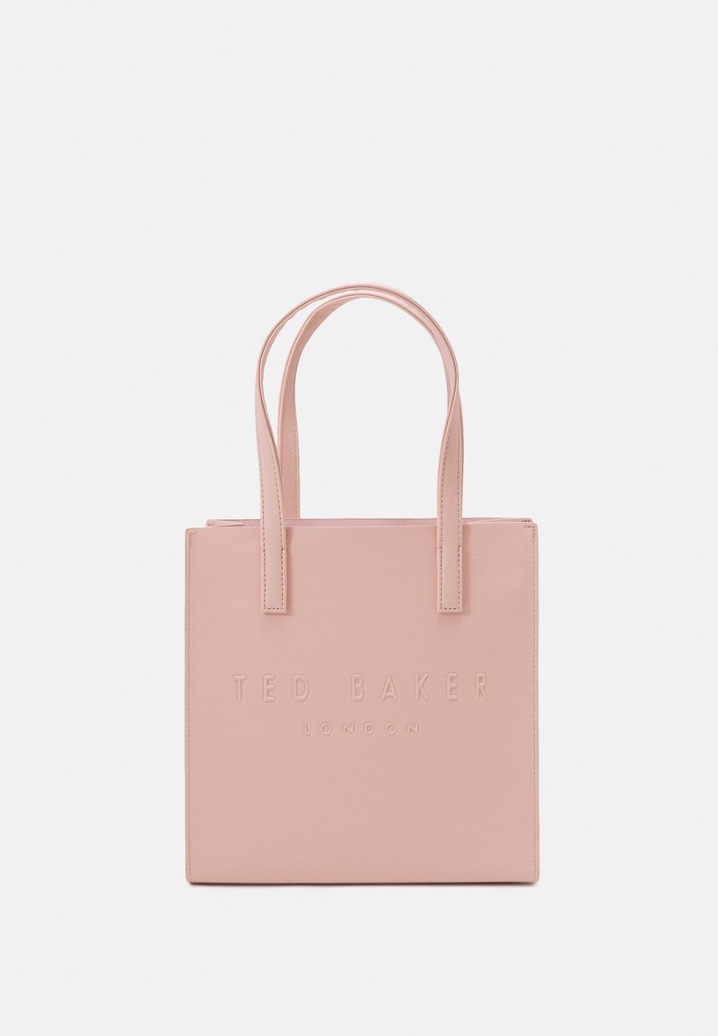 Pink faux leather tote bag with two handles, embossed logo "TED BAKER LONDON" on the front, square shape, smooth texture, minimal design.
