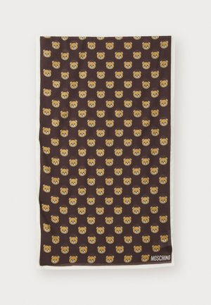 Brown fabric with repeating bear face pattern; features a white border and Moschino branding. Material appears soft and lightweight.