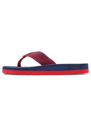 Flip-flop in red and blue, featuring a textured upper strap, soft footbed, and a thick rubber sole with serrated edges for grip.