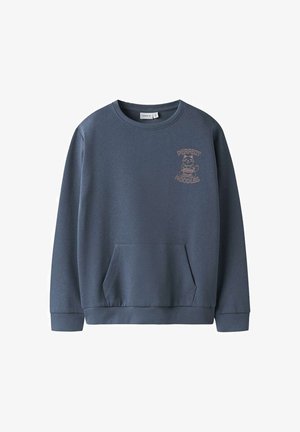 Sweat-shirt bleu foncé avec poche avant et petit graphique d'un chat tenant des nouilles avec le texte "Perfect Noodles" sur la poitrine.