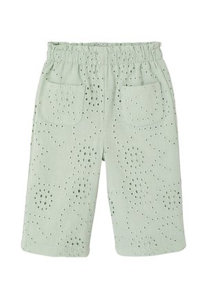 Light green kids’ shorts with elastic waistband, front pockets, and eyelet floral cutout embroidery pattern.