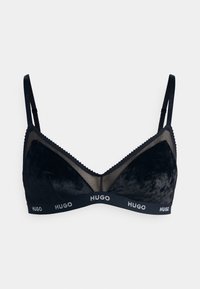 Black bra with a velvet texture, mesh panels, and scalloped edges. Features a logo band with "HUGO" in contrasting white.