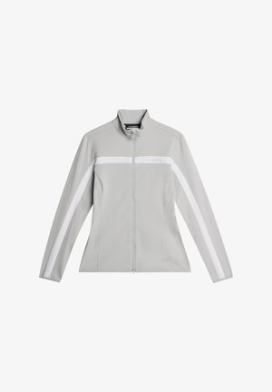Grau zip-up Jacke mit hohem Kragen, versehen mit weißen horizontalen Streifen auf der Brust und den Ärmeln, hergestellt aus einem glatten, leichten Material.