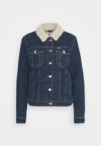 Dark blue denim jacket with white fleece collar, button front closure, two chest pockets, and side pockets, displayed on white background.