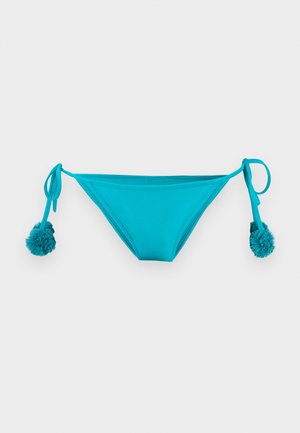 Bright turquoise bikini bottom with side ties ending in pom-pom details, displayed against a plain light background.