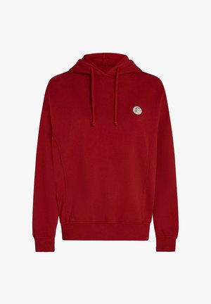 Červená mikina s kapucňou, vybavená predným vreckom, rebrovanými manžetami a malým kruhovým logom na hrudi. Vyrobená z mäkkej tkaniny.