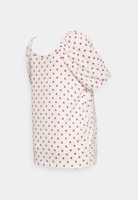 Top branco de manga curta com bolinhas laranja, com decote quadrado e mangas bufantes, feito de tecido leve.