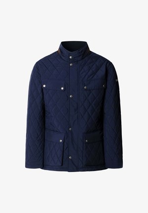 Chaqueta de punto azul marino con un alto cuello, dos bolsillos en el pecho con solapa y cierres a presión, y dos grandes bolsillos inferiores.
