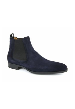 Navy blue suede Chelsea boot with black elastic side panels, low heel, and pull tab at the back on a white background.