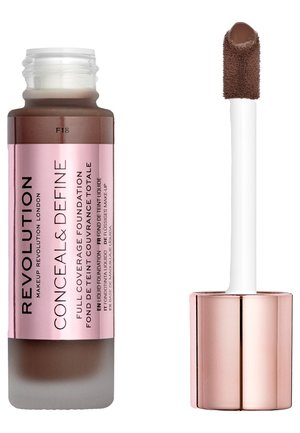Fond de teint liquide marron dans un flacon transparent avec une étiquette rose. Comprend un applicateur blanc avec une pointe douce et texturée.