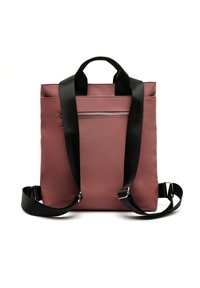 Ruched backpack in mauve faux leather with adjustable black straps and a front zip pocket. Features a minimalist design and structured shape.