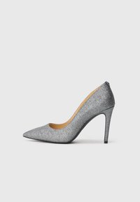Silver glitter high-heeled pump with a pointed toe and a sleek silhouette, featuring a smooth inner lining and a durable black outsole.