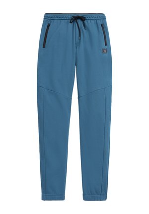 Blue sweatpants with a drawstring waist, two zippered side pockets, and tapered legs. Smooth fabric with a subtle sheen and stitching details.