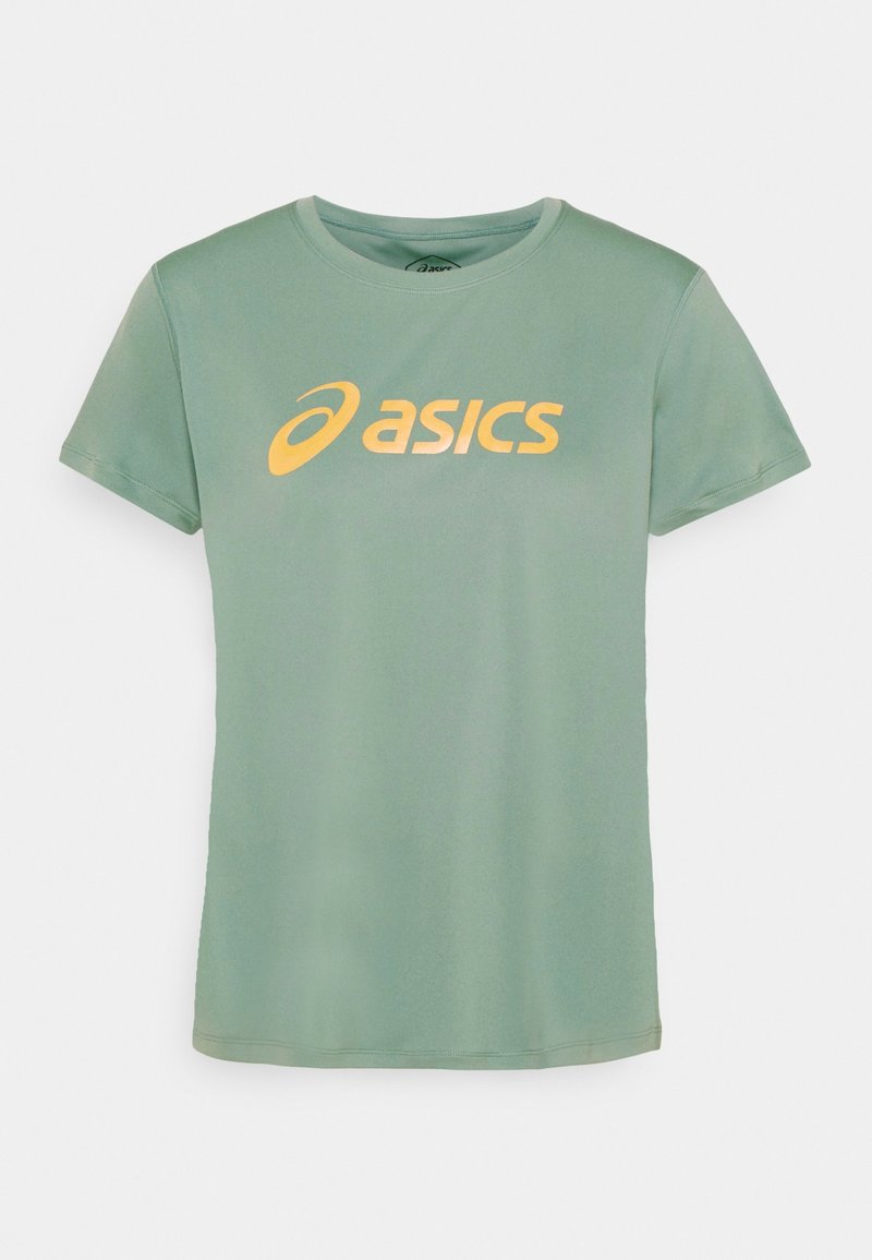 Vaaleanpunainen lyhythihainen t-paita pehmeää kangasta, jossa on suuri keltainen ASICS-logo keskitettynä etuosassa. Pyöreä kaula-aukko.