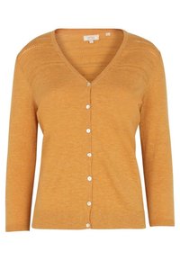 Senapsgul cardigan med v-ringning, långa ärmar och vit knappstängning. Texturerad sömnadsdetalj över axlarna.