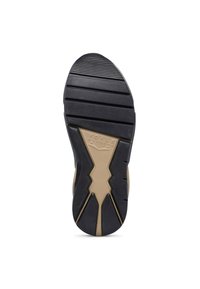 Suola di scarpa in gomma nera con un motivo a zigzag e battistrada testurizzato, con accenti beige e scanalature per la trazione.