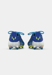 Blue football boots featuring a textured upper, contrasting neon accents, and a white sole with multicolored studs. Laces are tied at the back.