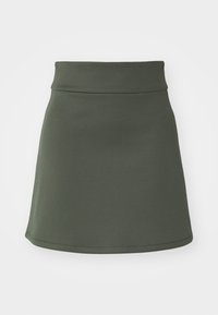 Grön minikjol i stretchigt material. Har ett figursytt midjeband och en utsvängd nederkant. Slät yta utan synliga mönster eller detaljer.