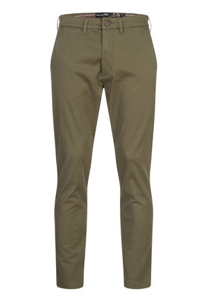 Chinos w kolorze oliwkowym, wykonane z mieszanki bawełny, o prostym kroju, z zapięciem na guzik i z pętlami na pasek. Prosty design bez wzorów.