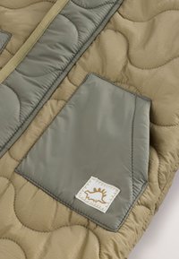 Next REGULAR FIT - SHOWER RESISTANT - Lyžařská kombinéza - khaki green