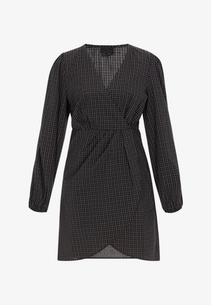 Mustapisteinen ruudullinen kietaisumekko pitkillä hihoilla, vyötäröllä kerrostettu yksityiskohta ja v-pääntie. Kevyt kangas, jossa on sileä rakenne.