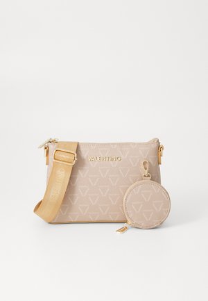 Beige faux leather crossbody bag with embossed logo pattern, gold-tone hardware, detachable round coin purse, adjustable strap.