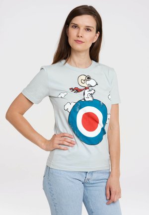 Light blue t-shirt featuring a graphic of Snoopy on a blue target with a red and white bullseye. Soft cotton material, short sleeves.