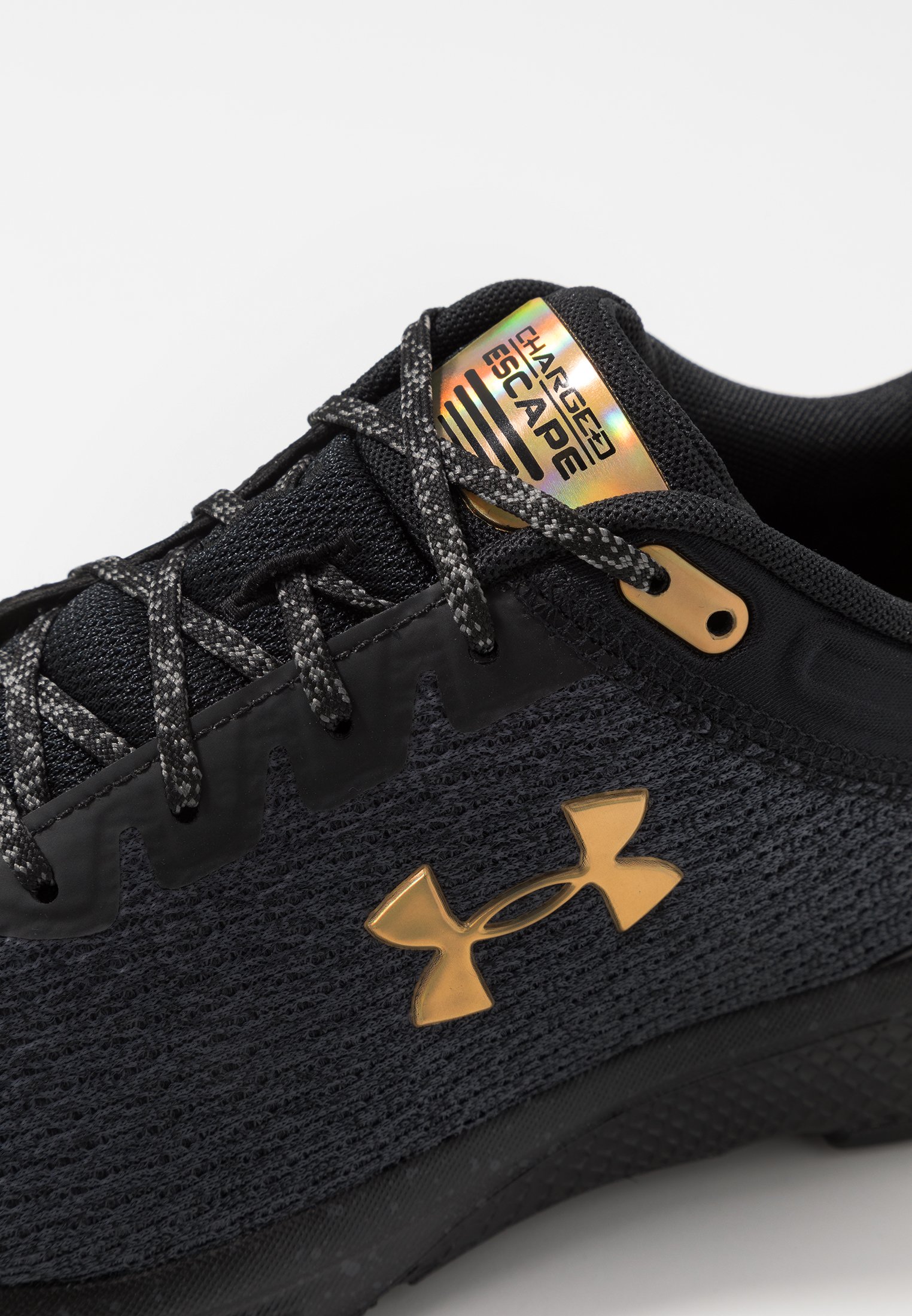 under armour shoes black gold