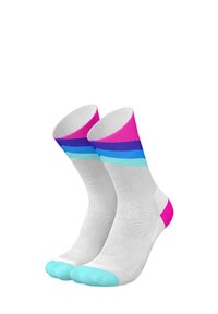 White athletic socks with a textured fabric, featuring pink, purple, and blue striped patterns at the top and teal accents on the toes.