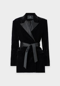 Black velvet blazer with satin shawl collar, long sleeves, front pockets, and a tied belt at the waist. Smooth texture and tailored design.