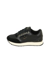 Black athletic shoe with mesh and suede upper, gold eyelets, textured black sole, and cream midsole. Features logo on side and tongue.