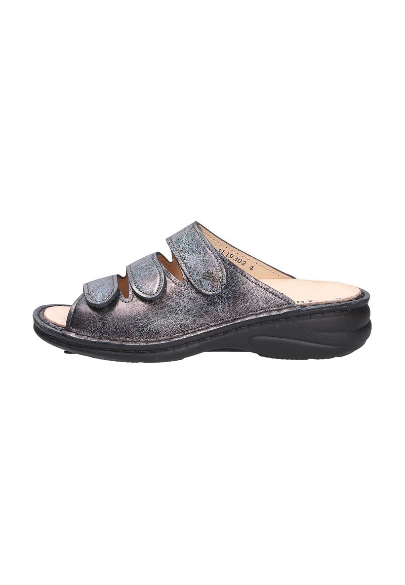 Black slide sandal with three adjustable straps, made of metallic leather. Features a contoured footbed and a durable, cushioned sole.