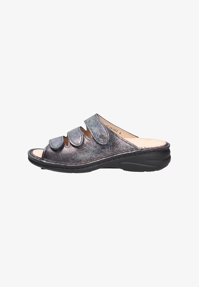 Black slide sandal with three adjustable straps, made of metallic leather. Features a contoured footbed and a durable, cushioned sole.