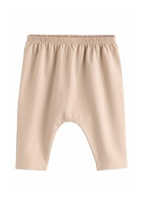 Lys beige bomuldsshorts med elastisk talje, der har en løstsiddende pasform og knælangt design. Blød tekstur, ingen mønstre eller dekorationer.