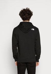 The North Face Jersey con capucha - black