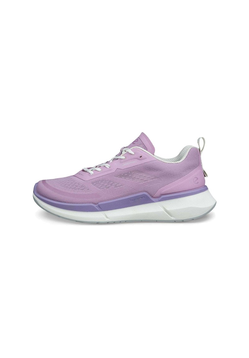 Scarpa atletica leggera in rosa e lavanda, con tomaia in rete, suola bianca ammortizzata e dettagli riflettenti sul tallone.