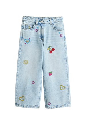Light blue wide-leg jeans with embroidered colorful hearts, cherries, strawberry, sun, and small flowers scattered on the front.