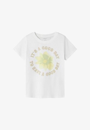 Bijela pamučna majica s grafikom svijetložutih cvjetova i tekstom "DANAS JE DOBAR DAN ZA DOBAR DAN" raspoređenim u kružnom obliku.