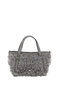 Gray handbag with curly textured fabric, featuring leather accents and two handles; compact shape with a zippered top closure.