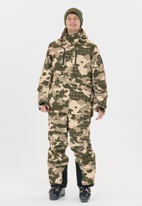 Kamuflage skijsæt i beige og grøn, bestående af en jakke med hætte og bukser. Har et rutenet-mønster og cargolommer. Sorte støvlekant.