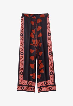 Pantalon noir à jambes larges avec imprimé floral rouge au centre et bordures décoratives roses avec motifs floraux et spirales noirs.