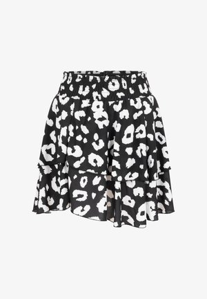 Svart-hvitt lagdelt miniskjørt med elastisk midjebånd, med et abstrakt leopardmønster.