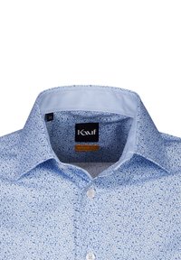 Camicia azzurra con motivo, dal taglio moderno, caratterizzata da un piccolo design floreale, colletto rigido e bottoni bianchi. Etichetta della taglia visibile (38).