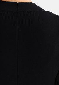 comma Kofta - black