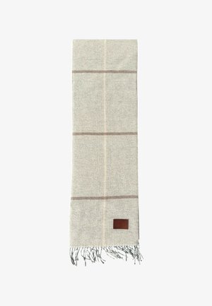 Sciarpa di lana beige chiaro con sottili strisce orizzontali e verticali più scure e più chiare, estremità frangiate e una piccola etichetta in pelle marrone.