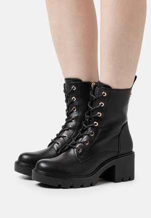 XTI Stivaletti stringati - black